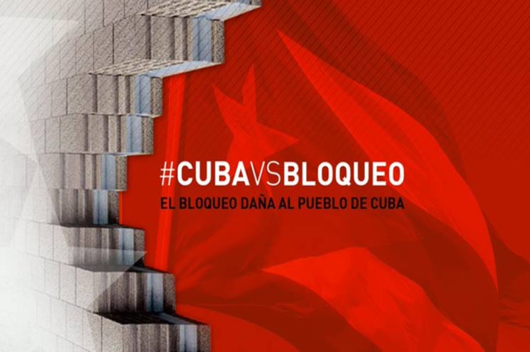Banner alegórico al bloqueo contra Cuba